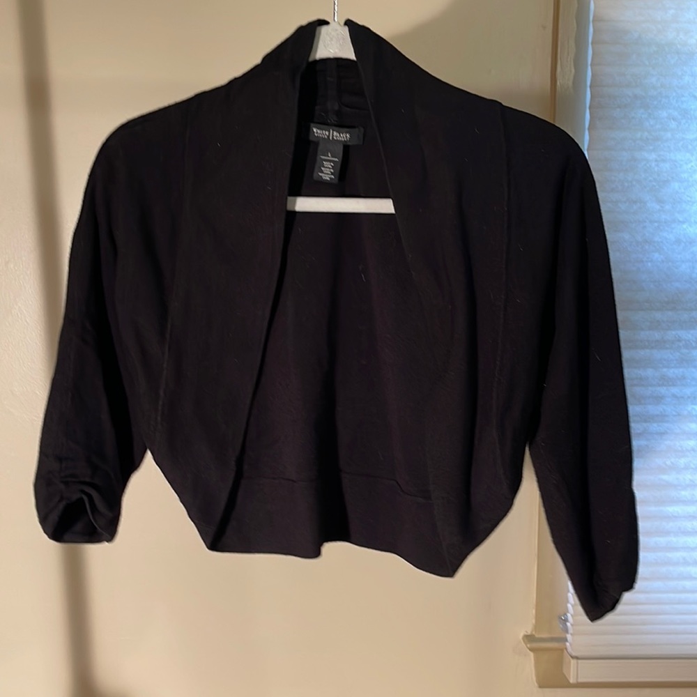 White House Black Market shrug